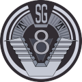 SG-8 badge.png
